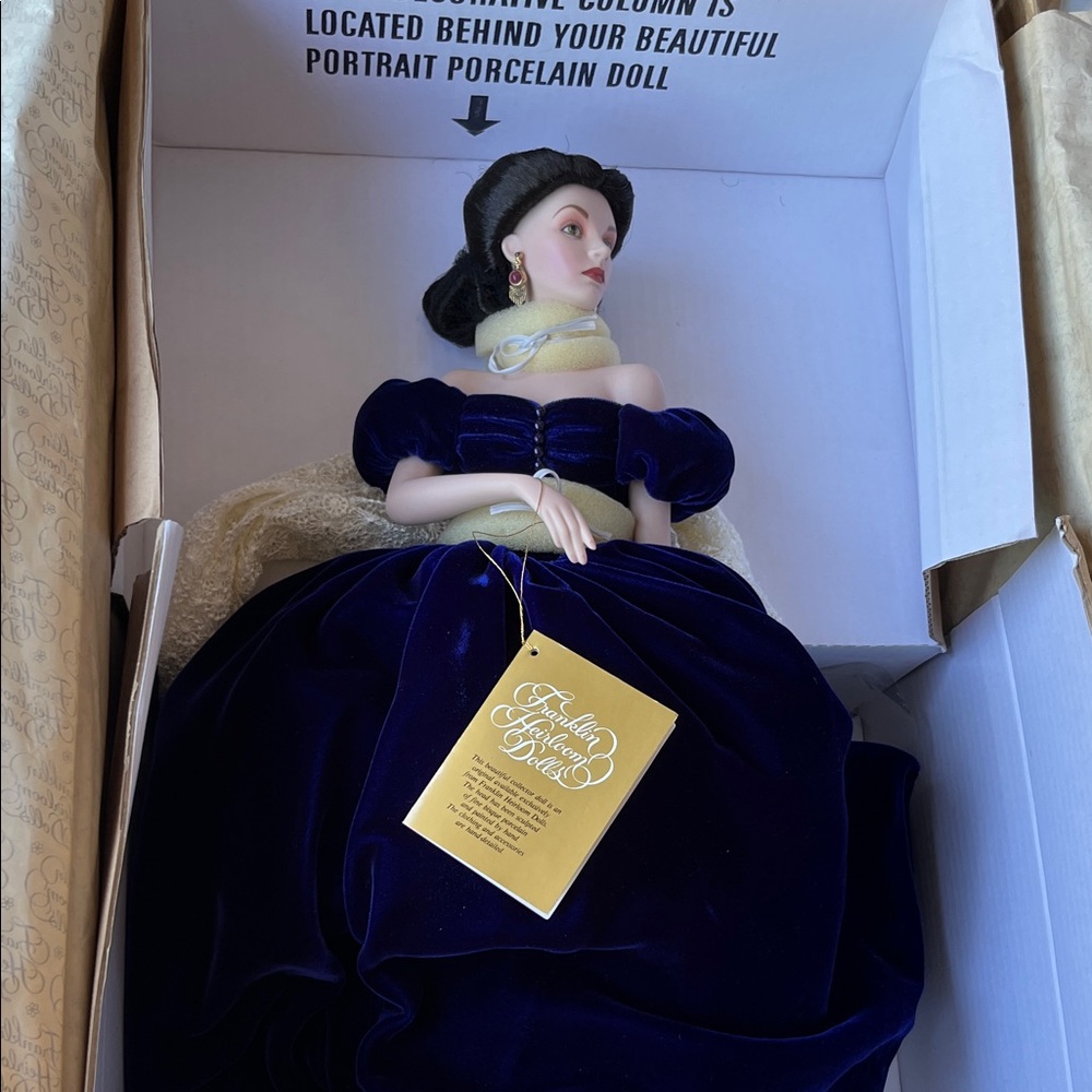 Elegant Porcelain Doll in Blue Dress